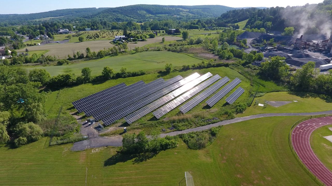 School districts turn unused land into solar farms to cut costs, fund classrooms