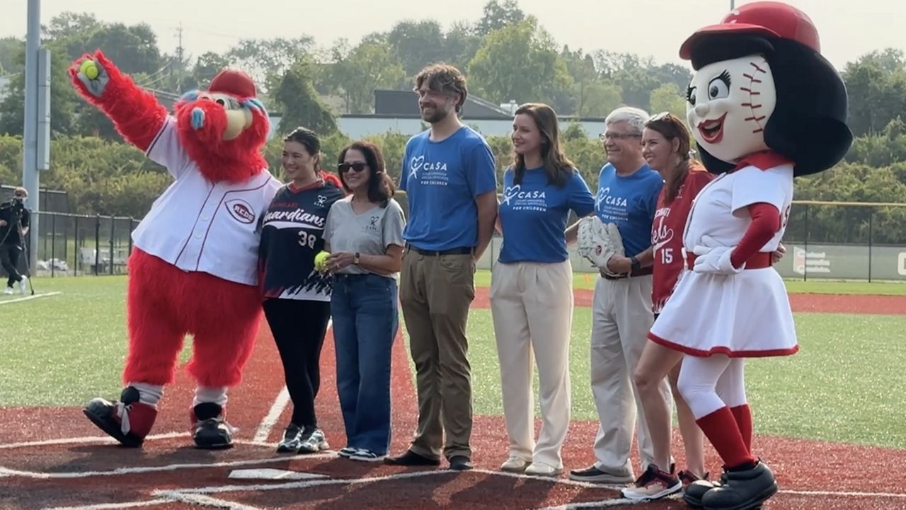 Families of Cincinnati Reds, Cleveland Guardians team up for charity softball game