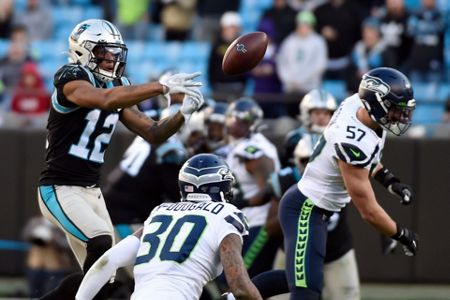 Wilson, Carson lift Seahawks past Panthers 30-24