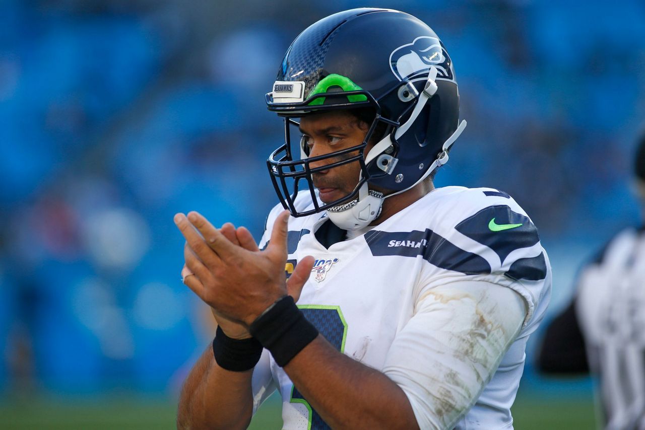 Russell Wilson, Chris Carson lift Seahawks past Panthers