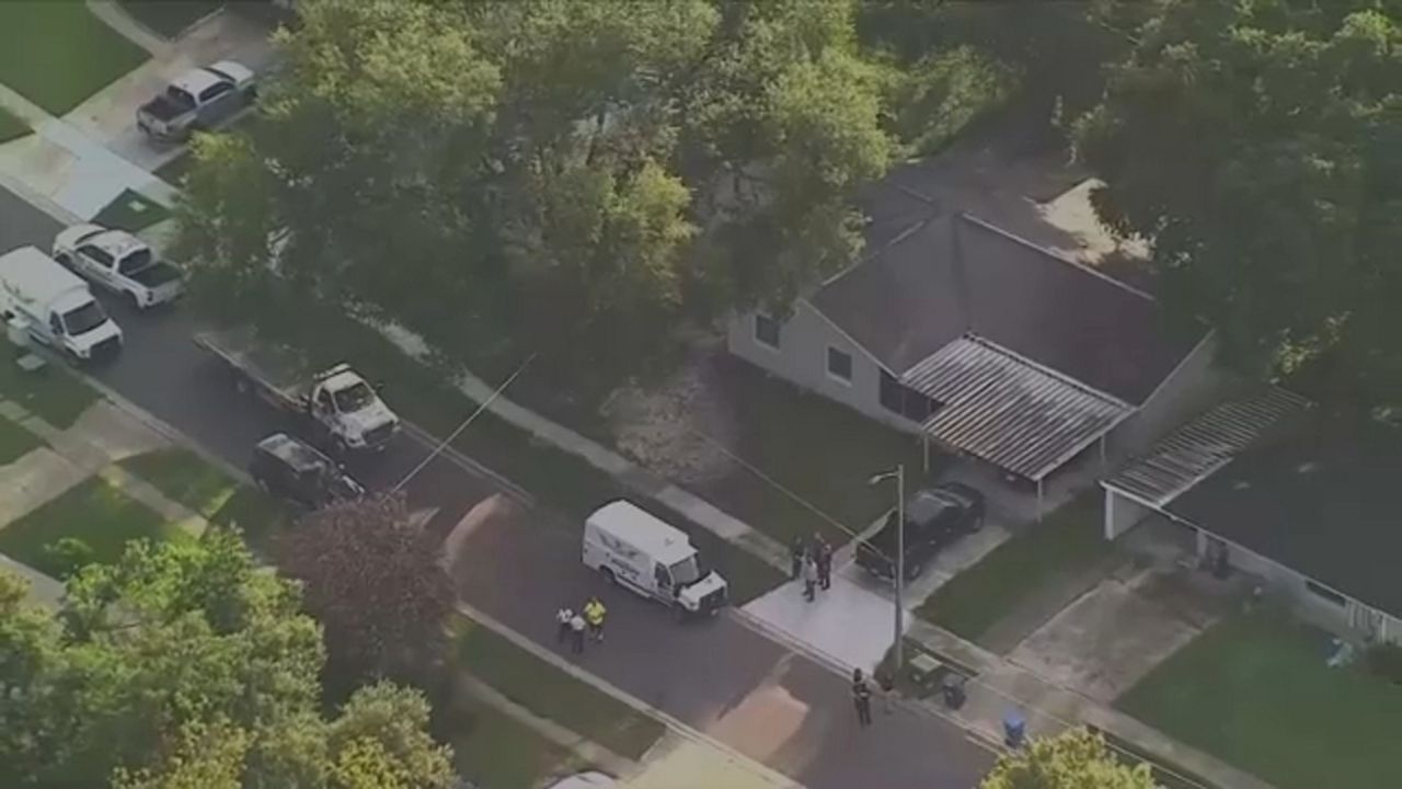 Deputies responded to a home in the 4000 block of Orange Street in Seffner just after 1 a.m. after receiving a call from a person who didn’t speak to the dispatcher.  Upon arriving, deputies found a woman dead inside a vehicle with severe upper body trauma. (Sky 9 image)