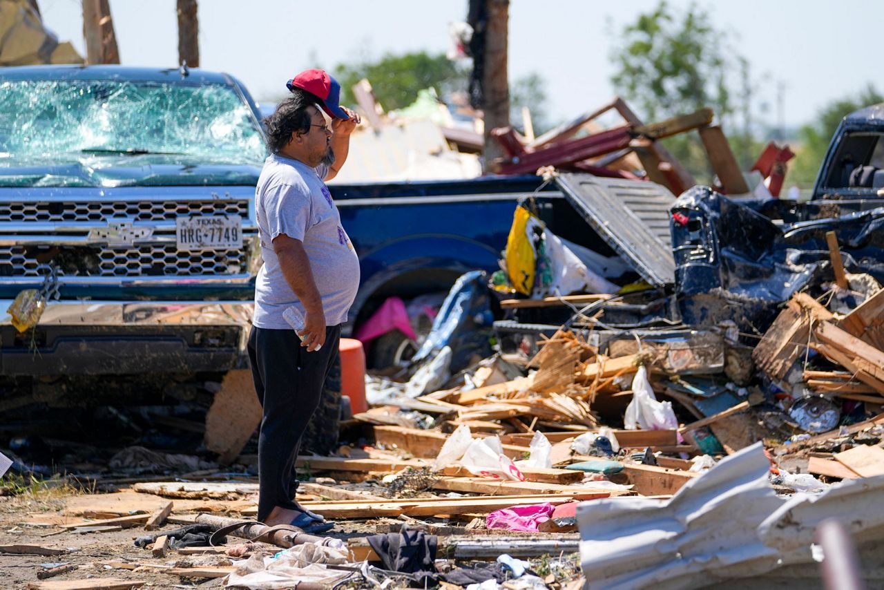 In a north Texas county, dazed residents sift through homes mangled by ...