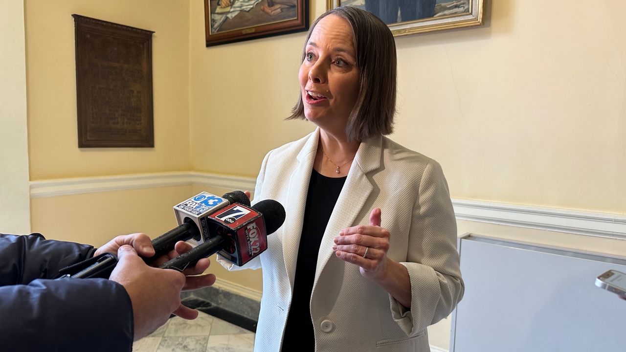 Secretary of State Shenna Bellows answers questions from reporters Tuesday after the House defeated a measure to begin impeachment proceedings against her. (Spectrum News/Susan Cover)