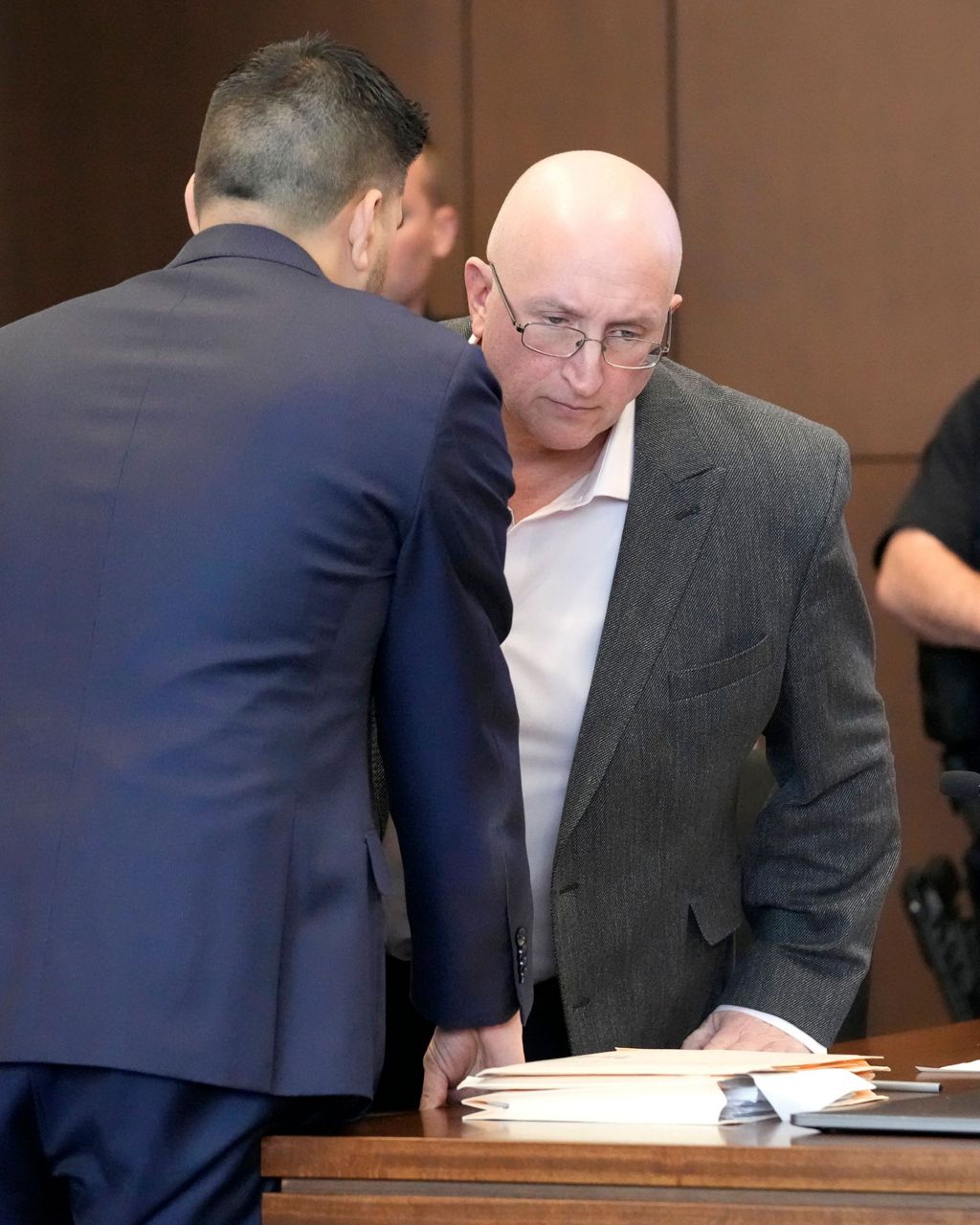 Father of July 4 parade shooting suspect pleads not guilty