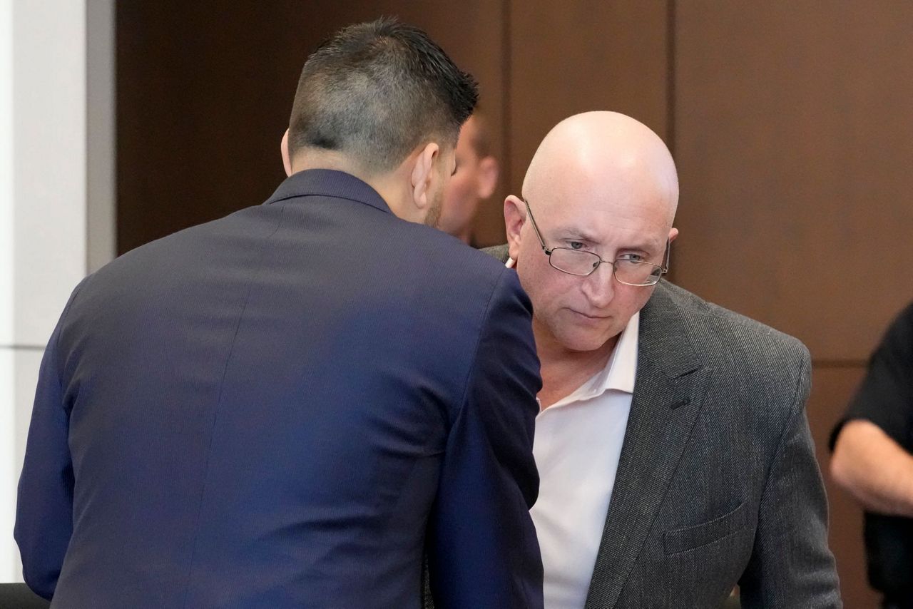 Father of July 4 parade shooting suspect pleads not guilty