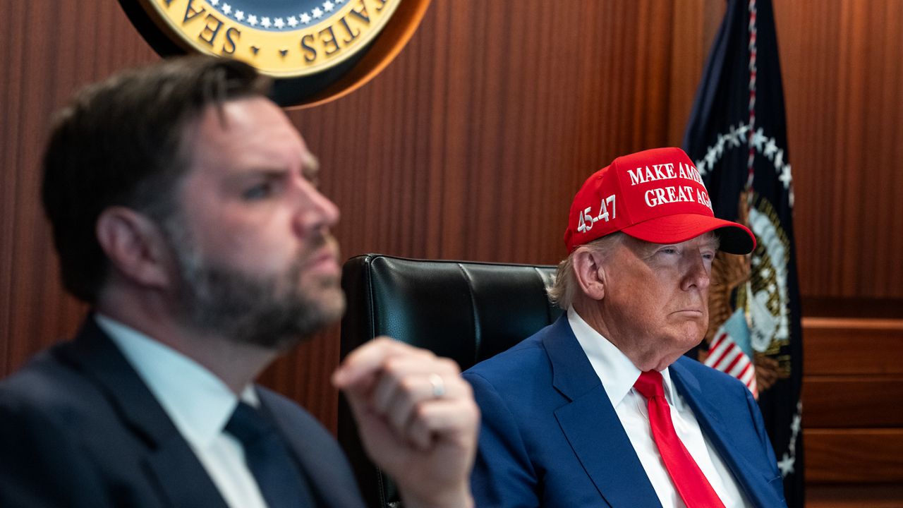 In this image provided by the White House, President Donald Trump, right, and Vice President JD Vance sit in the Situation Room, Saturday, June 21, 2025, at the White House in Washington. (The White House via AP)
