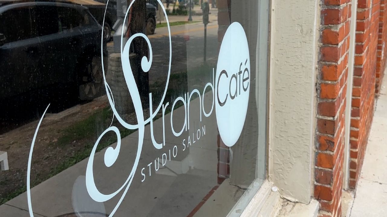 Chris Crump created Slate Strands to provide products and services for textured, graying hair. (Spectrum News 1/Aliah Keller)