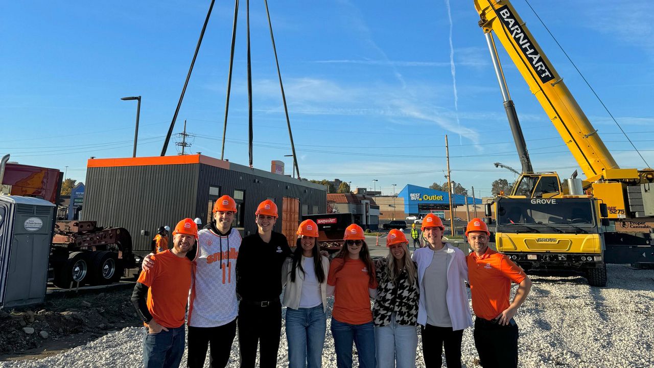 On Saturday, a ceremonial “can drop” took place in Bridgeton where a new Smalls Sliders restaurant will be located. Crews installed the location’s shipping containers, which will serve as the restaurant’s building. (Photo courtesy of Smalls Sliders)