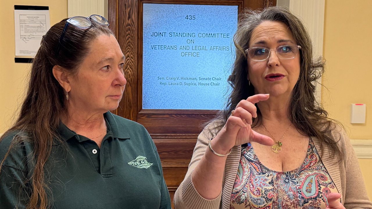 Tammy Smith, left, and Catherine Lewis, who both represent Medical Marijuana Caregivers of Maine, talk about their concerns with parts of the medical cannabis testing bill. (Spectrum News/Susan Cover)
