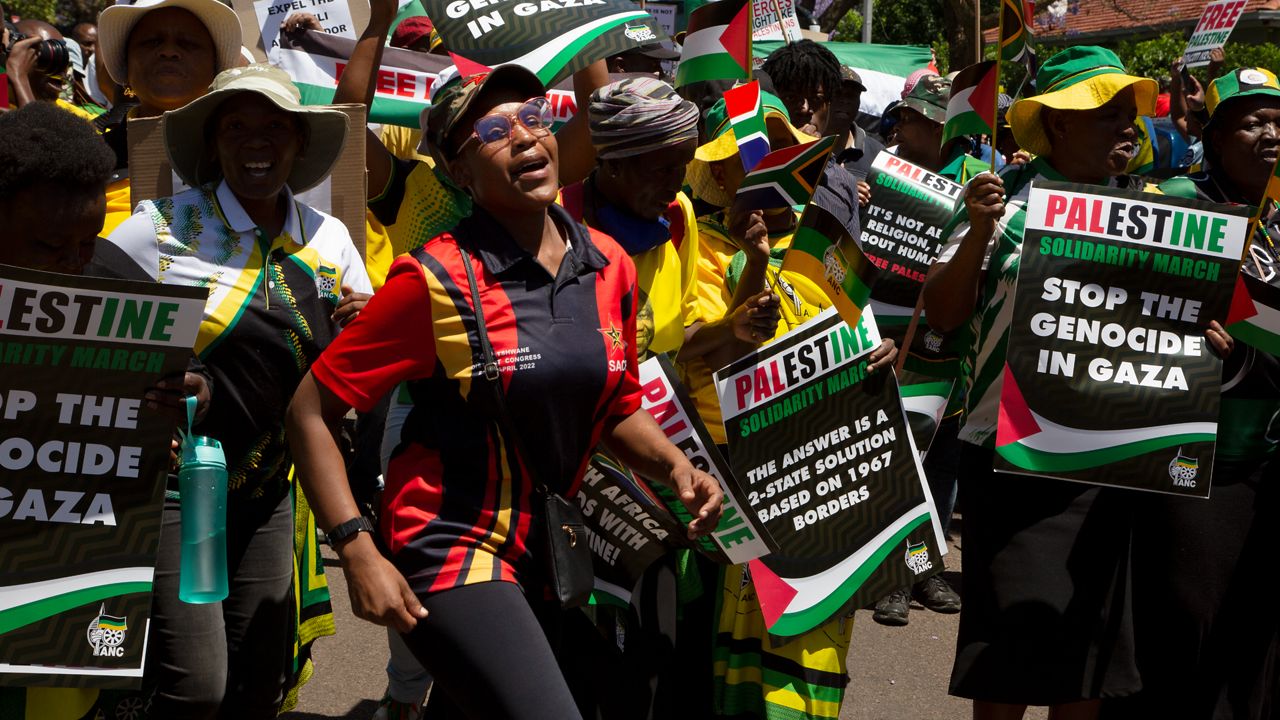 Pro-Palestinian supporters demonstrate at the entrance to the Israeli embassy in Pretoria, South Africa, on Oct. 20, 2023. South Africa's government has recalled Monday Nov. 6, 2023 its ambassador and diplomatic mission to Israel in condemnation of the bombardment of the Gaza Strip, calling it “a genocide”. (AP Photo/Denis Farrell, File)