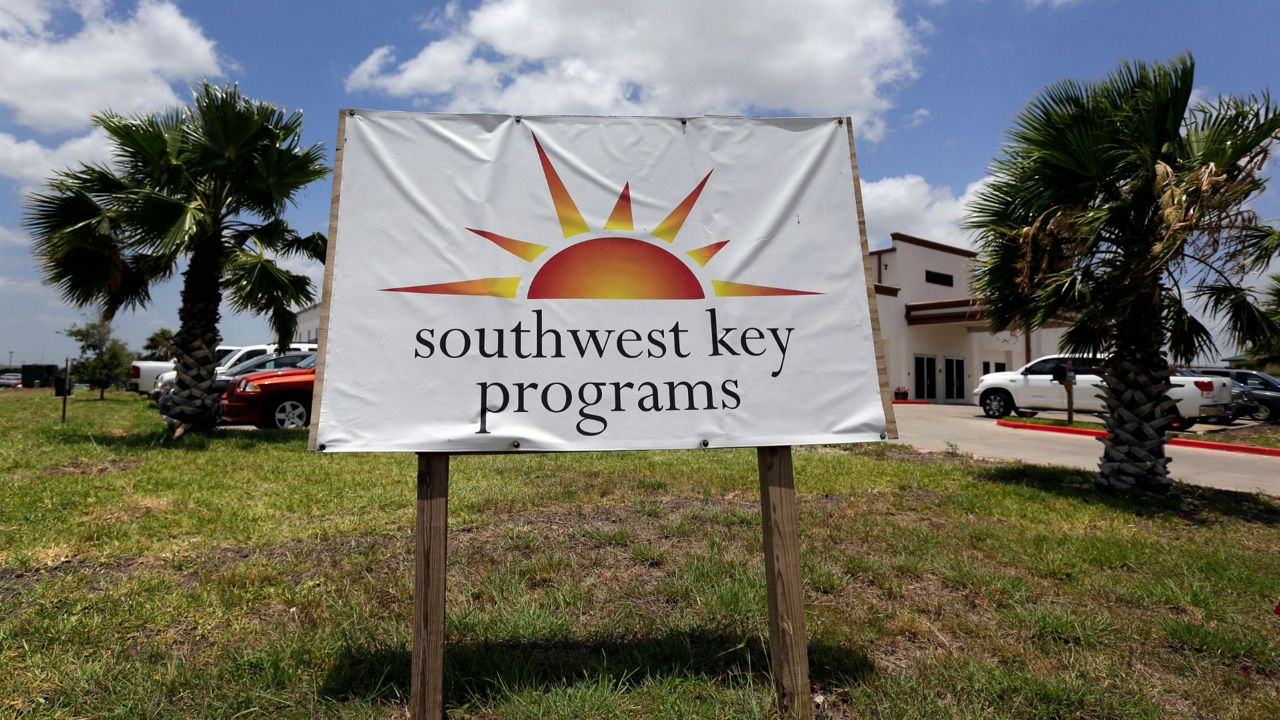 This June 20, 2014, file photo shows a Southwest Key Programs sign in Brownsville, Texas. (AP Photo/Eric Gay, File)