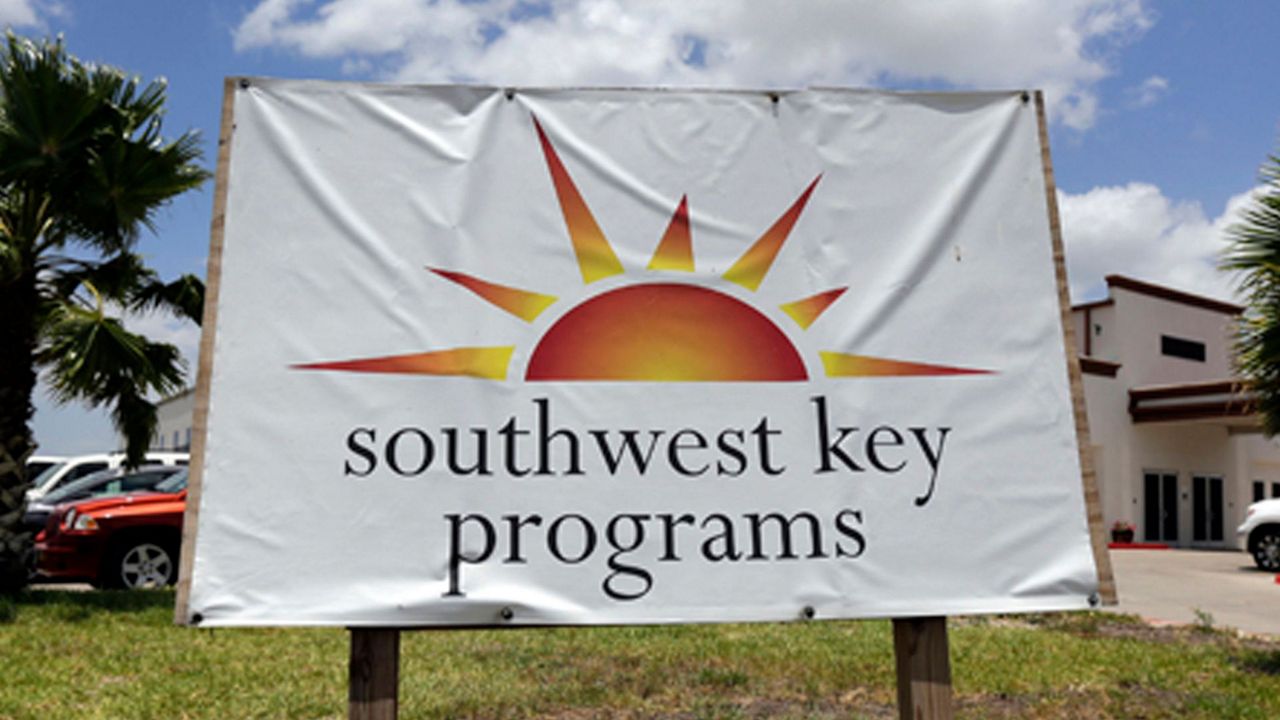 This June 20, 2014, file photo shows a Southwest Key Programs sign in Brownsville, Texas. (AP Photo/Eric Gay, File)