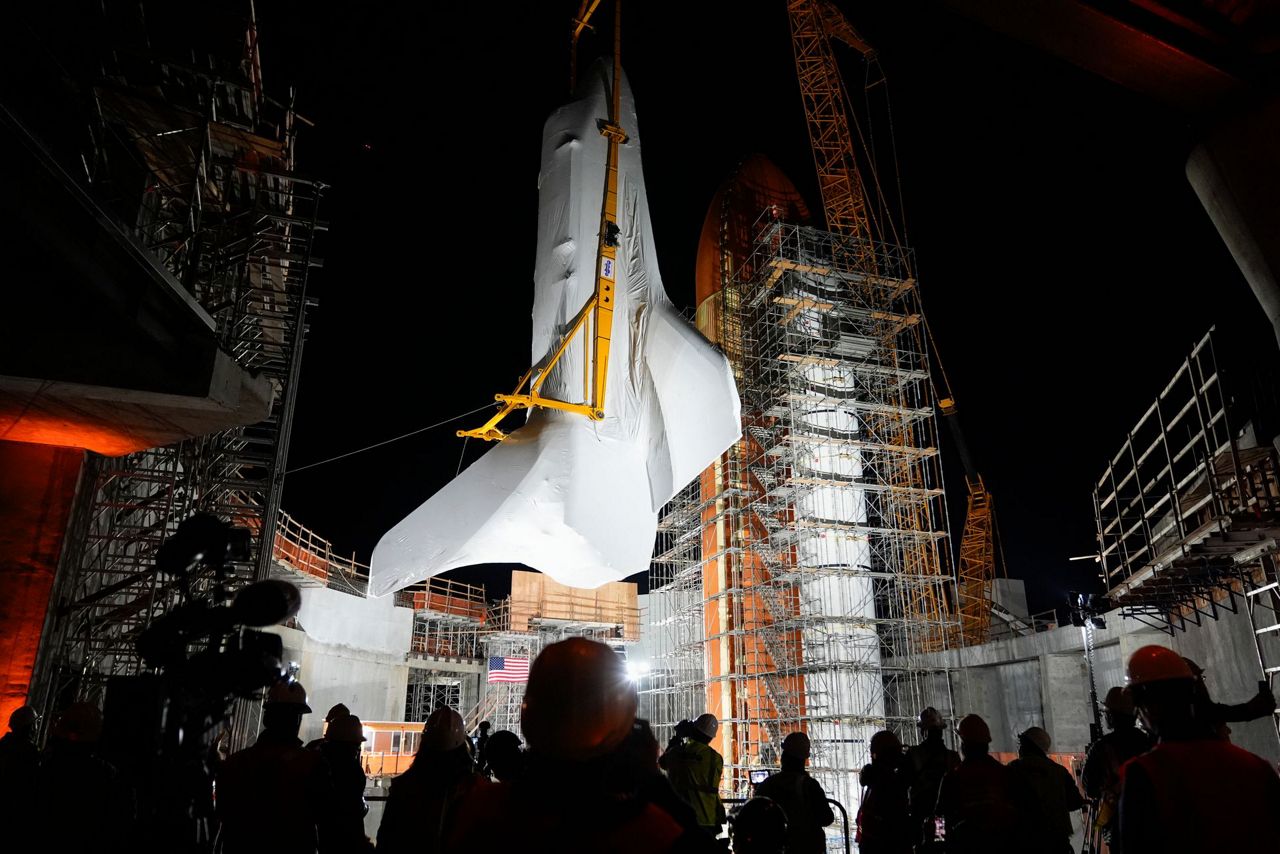 Space Shuttle Endeavour Hoisted For Installation In Vertical Display At ...