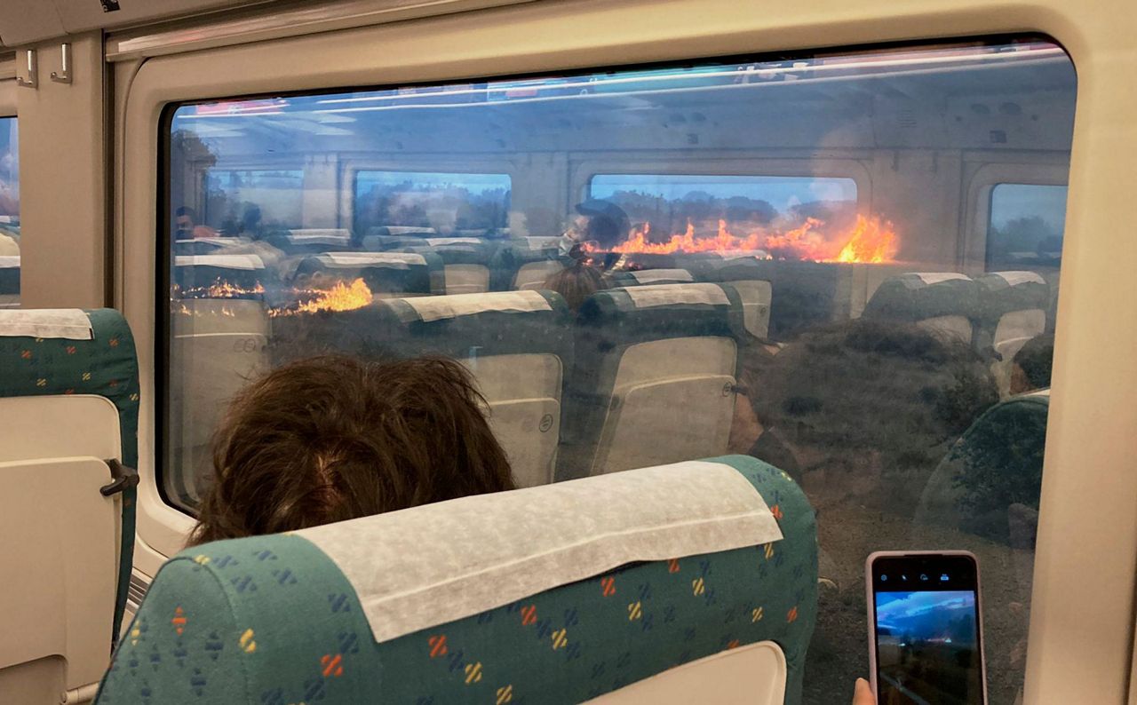 Help! Spaniards spooked when their train stops in wildfire