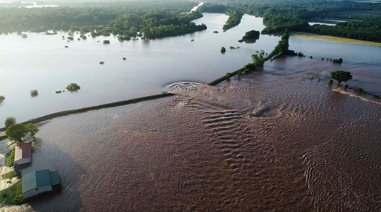 Record flooding causes levee breach in western Arkansas