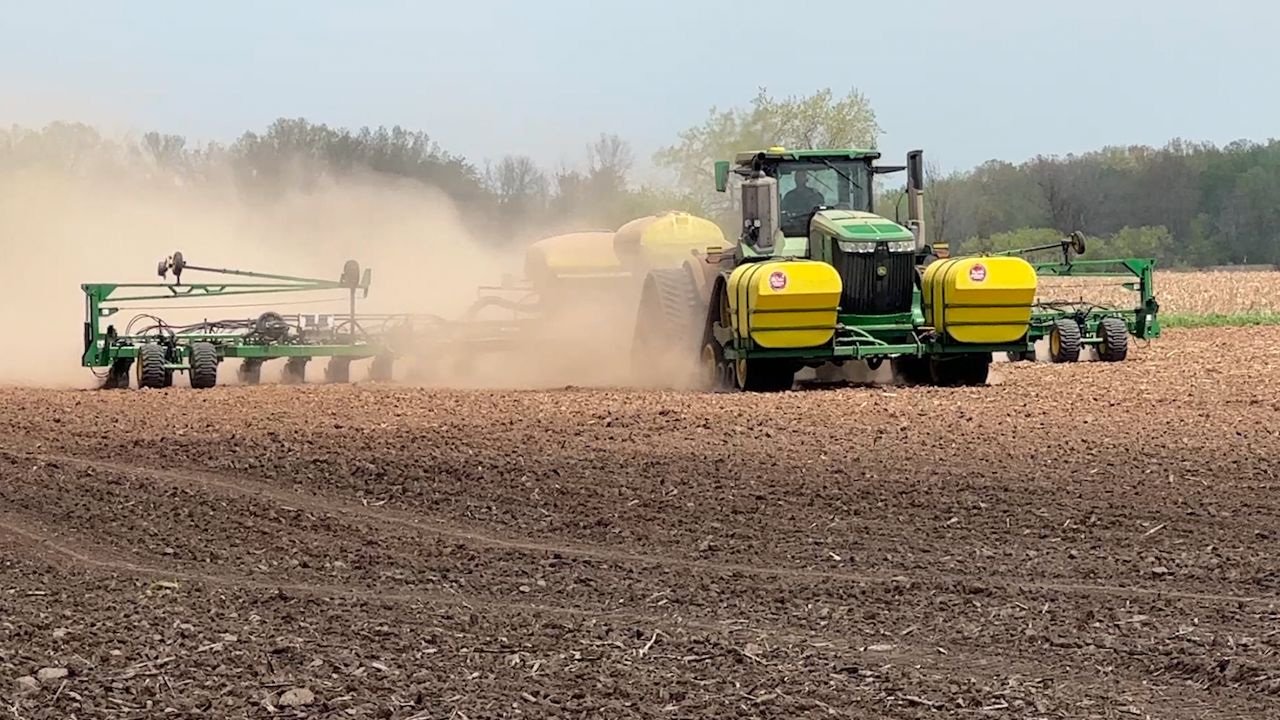 Spring planting hit full stride near De Pere in mid-May.