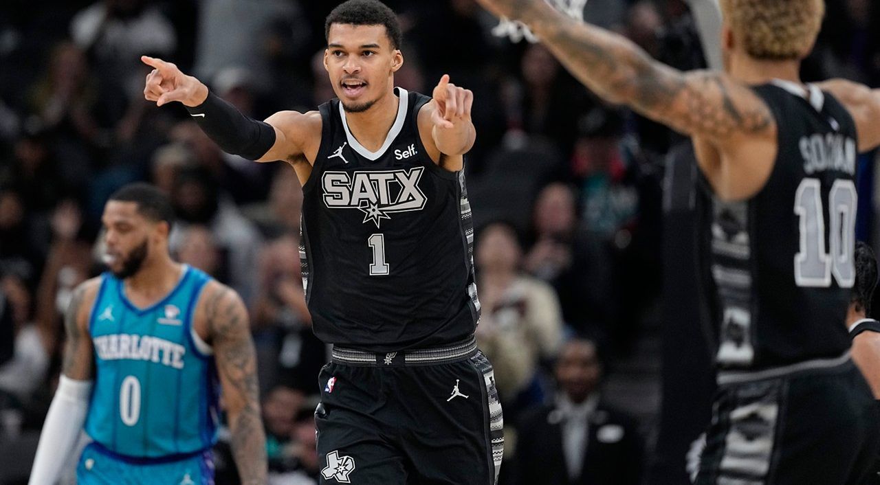 San Antonio Spurs center Victor Wembanyama (1) celebrates a score against the Charlotte Hornets during the second half of an NBA basketball game in San Antonio, Friday, Jan. 12, 2024. (AP Photo/Eric Gay)