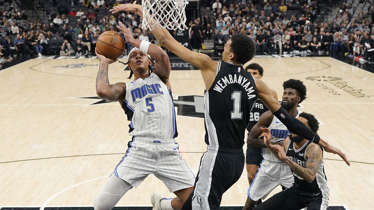 Magic stave off fourth-quarter rally and topple Spurs 108-98