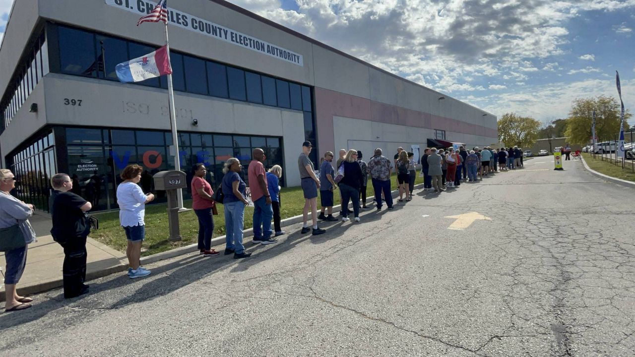 Voters wrapped their way around the outside of the St. Charles County Election Authority office in St. Peters Tuesday on the first day of no-excuse absentee voting ahead of the Nov. 5 General Election. (Spectrum News/Gregg Palermo)