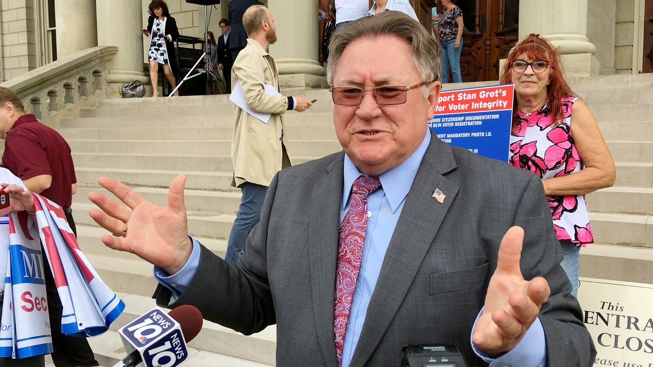 Shelby Township Clerk Stan Grot speaks with reporters after announcing his 2018 Republican run for Michigan secretary of state on Tuesday, Aug. 22, 2017, at the Capitol in Lansing, Mich. Grot, a Republican who has served as the Shelby Township clerk since 2012, was notified Thursday, July 20, 2023, that he will be prohibited from holding elections after being charged earlier this week for acting as a fake election in 2020 for then-President Donald Trump. (AP Photo/David Eggert, File)