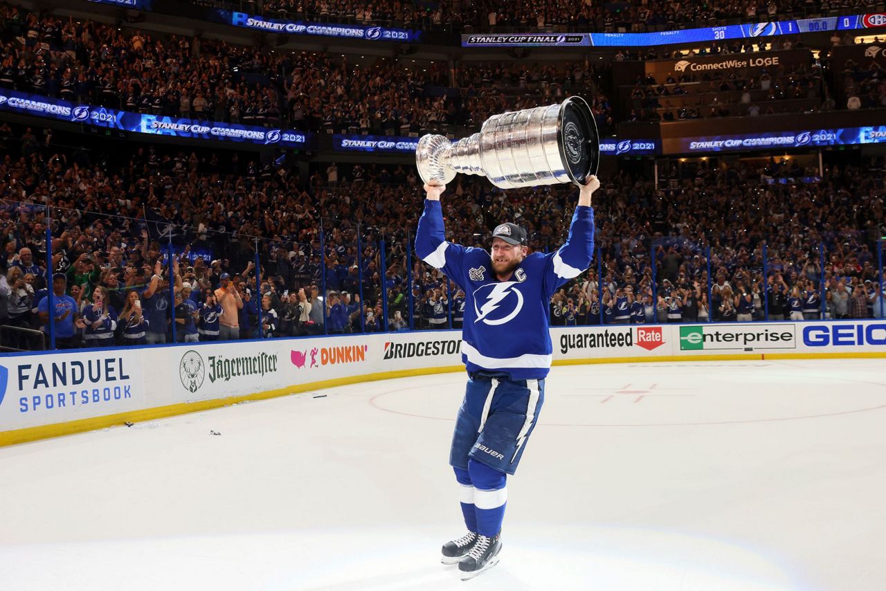 Andrey Vasilevskiy poses with members of Tampa Bay Lightning after