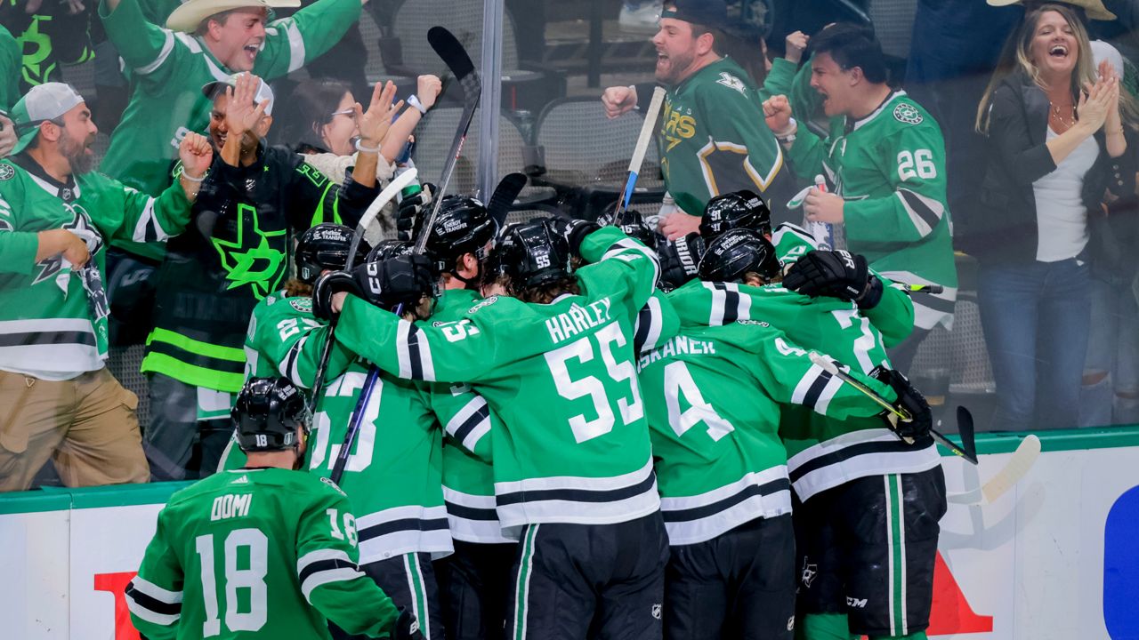 Dallas Stars celebrate Joe Pavelski's overtime goal against the Vegas Golden Knights in Game 4 of the NHL hockey Stanley Cup Western Conference finals Thursday, May 25, 2023, in Dallas. (AP Photo/Gareth Patterson)