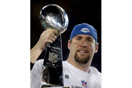 RAW FILE - A Seattle Seahawks player holds the Vince Lombardi