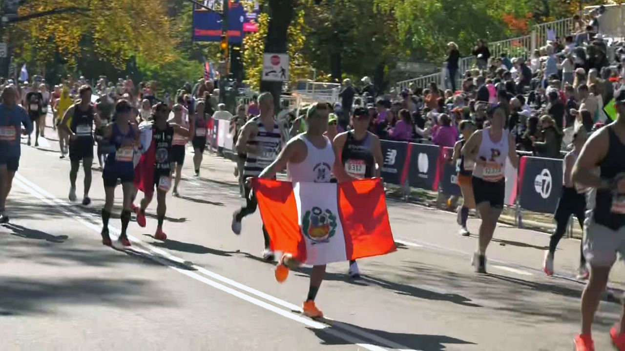 Runners celebrate Marathon Sunday at finish line