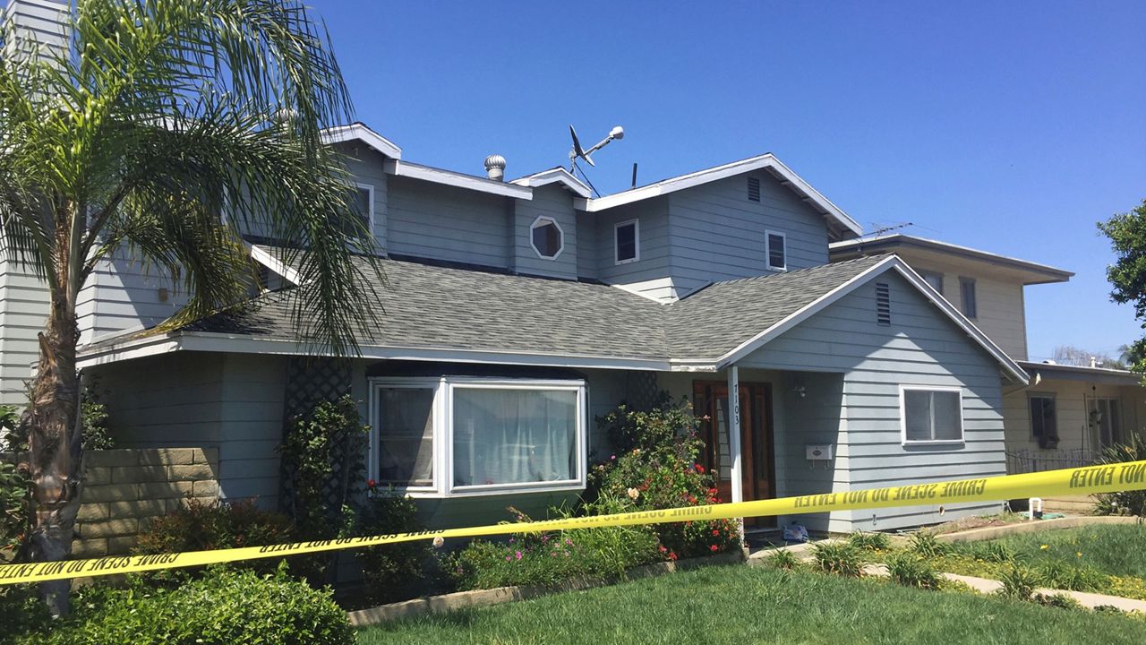 Tape surrounds the home occupied by Stephen Beal in Long Beach, Calif., on May 16, 2018. (AP Photo/Amanda Lee Myers)