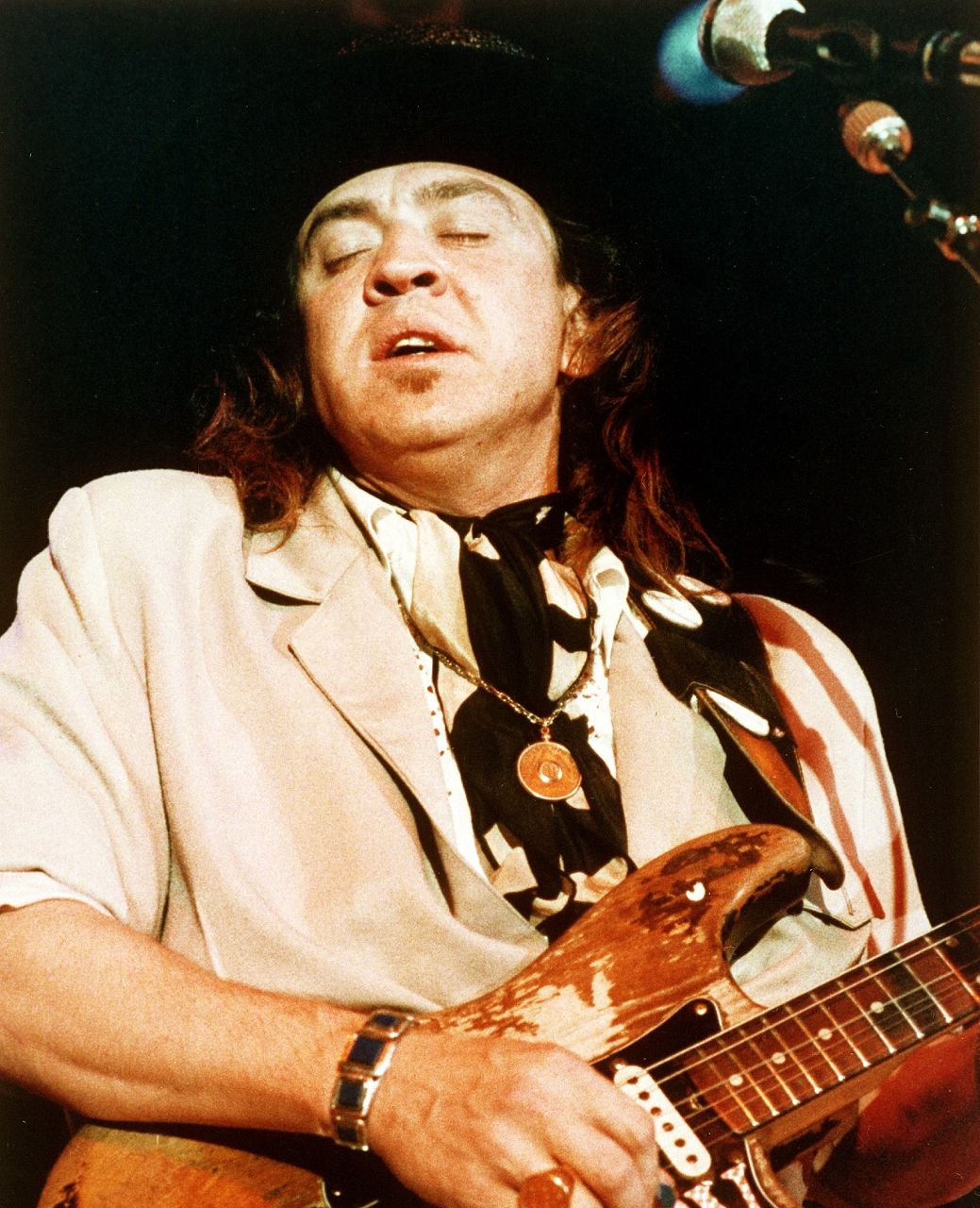 Blues guitarist Stevie Ray Vaughan is seen performing onstage at the Rhythm and Blues Foundation Benefit in Austin, Texas, in this 1988 photo. (AP Photo/Lisa Davis)