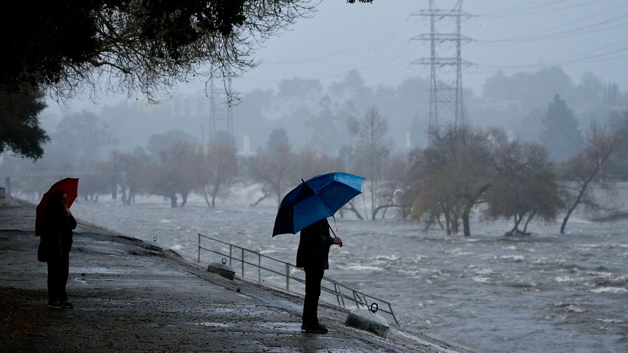 https://s7d2.scene7.com/is/image/TWCNews/Storm_rain_LA_River_AP_Damian_Dovarganes_Los_Angeles_02042024