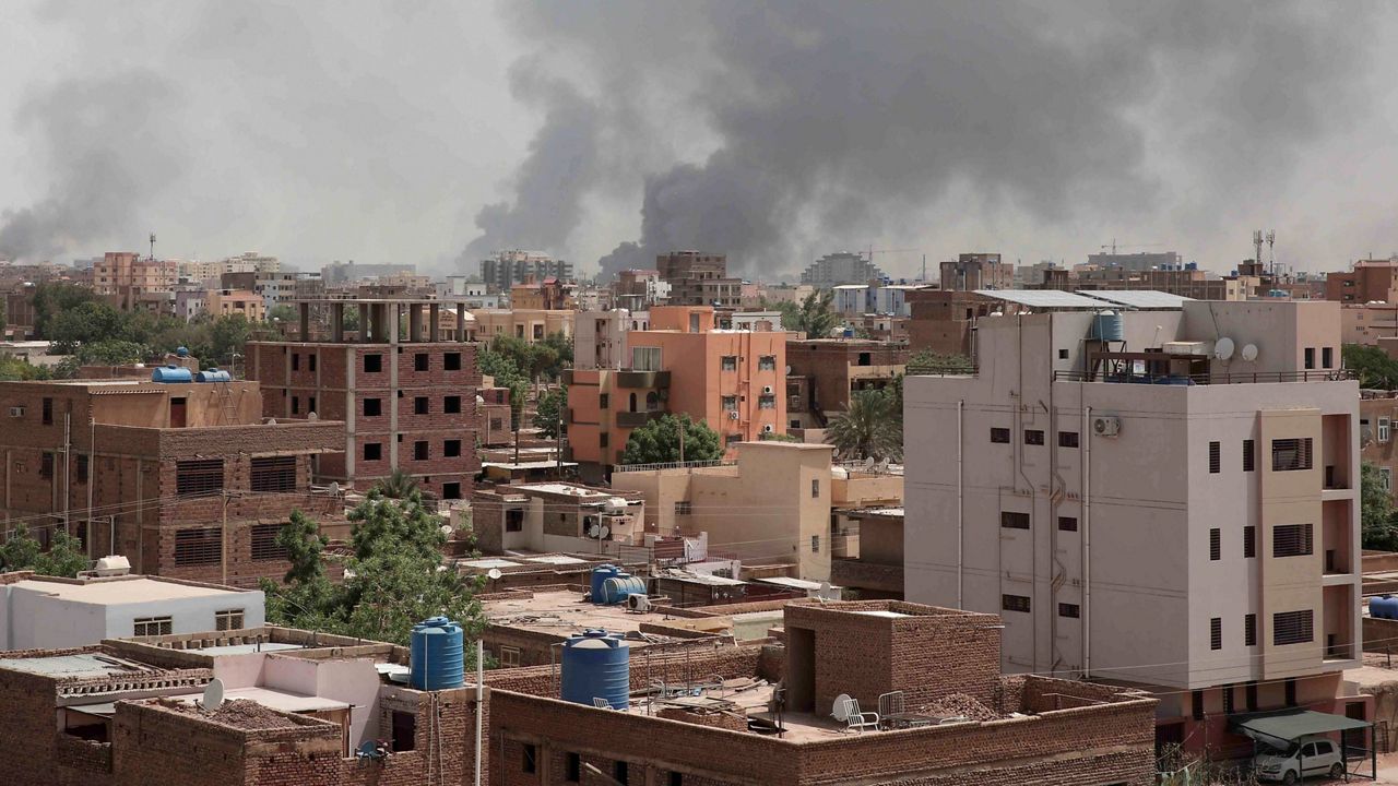 Smoke is seen rising from Khartoum's skyline, Sudan, Sunday, April 16, 2023. The Sudanese military and a powerful paramilitary group battled for control of the chaos-stricken nation for a second day Sunday, signaling they were unwilling to end hostilities despite mounting diplomatic pressure to cease fire. (AP Photo/Marwan Ali)