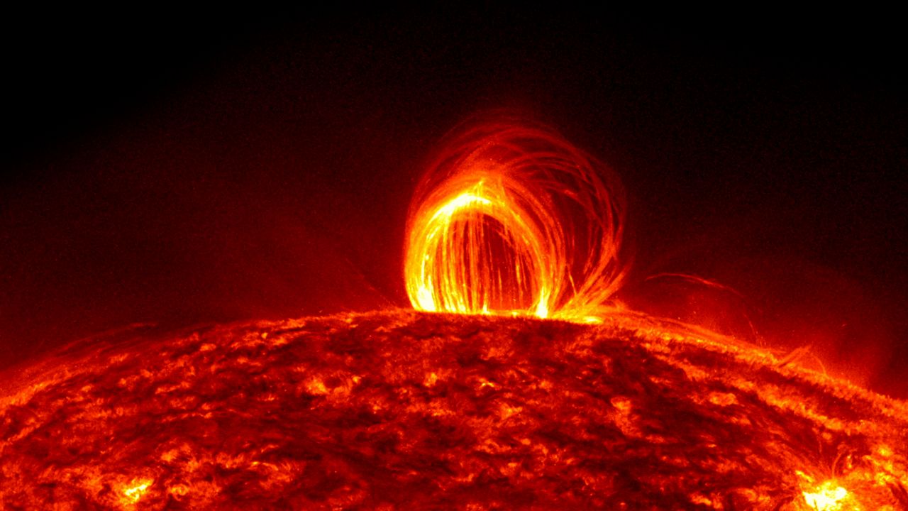 A coronal mass ejection is spotted by a nearby NASA satellite. (NASA)