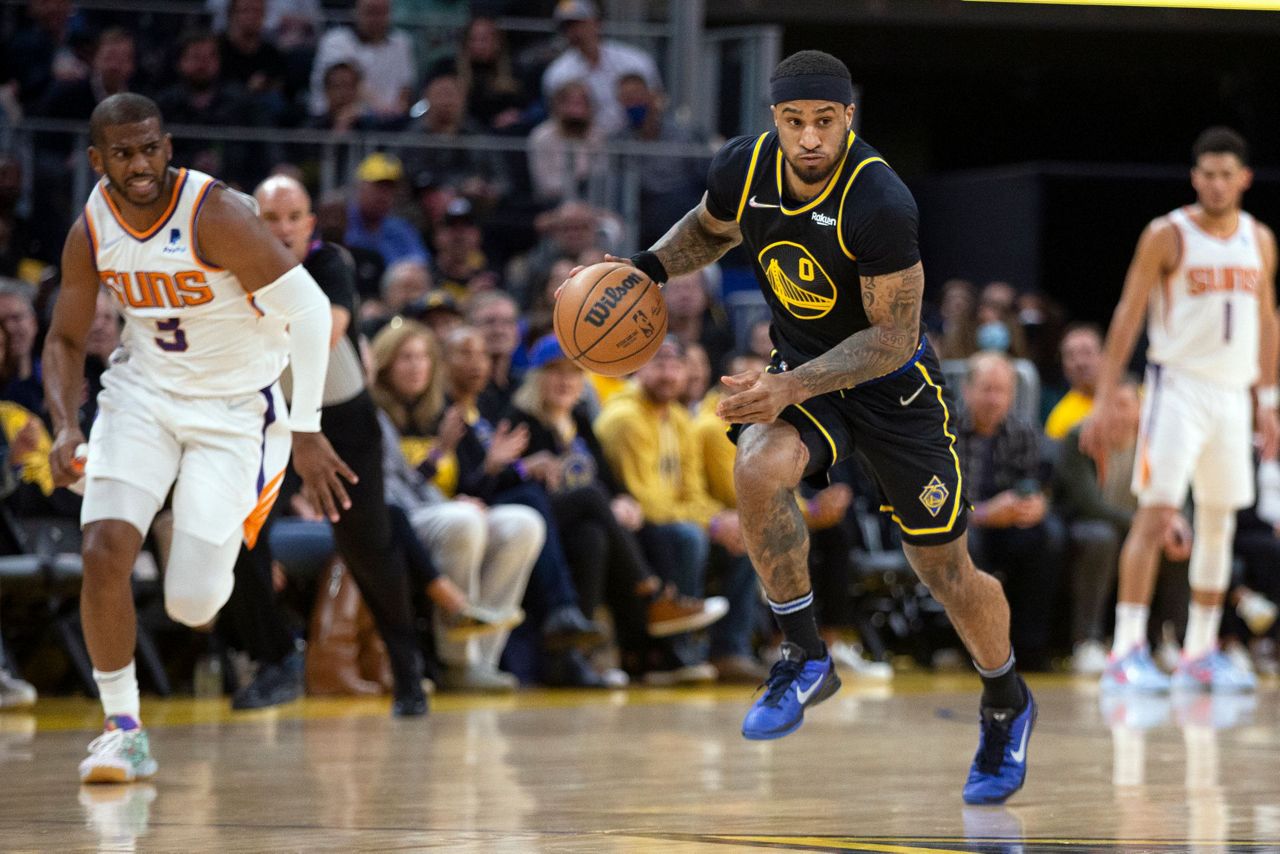 Booker, Paul deliver at end, Suns hold off Warriors 107103