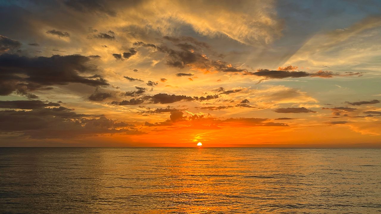 Sunset_Beach_Partly_Cloudy_FL_UGC_Lindse