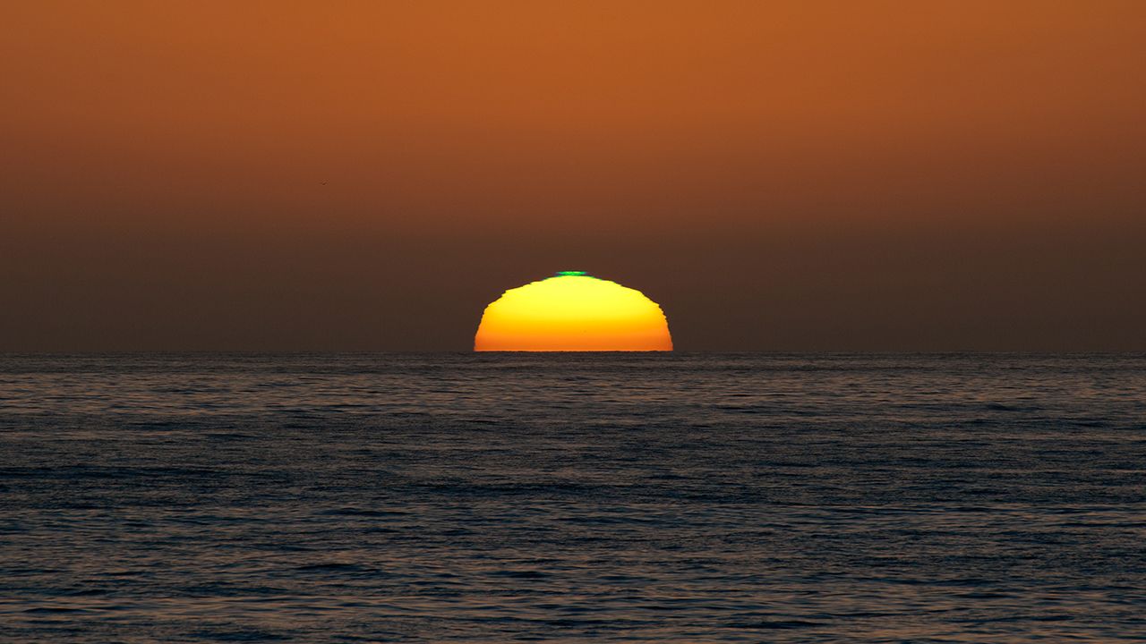 Under the right conditions, sometimes a flash of green can be seen at sunset as the sun drops below the horizon.