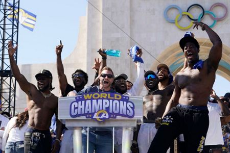 Los Angeles Rams defensive lineman Aaron Donald holds up the Vince Lombardi  Super Bowl trophy during the team's victory celebration and parade in Los  Angeles, Wednesday, Feb. 16, 2022, following the Rams'