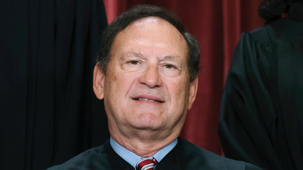 An upside-down American flag, a symbol associated with former President Donald Trump's false claims of election fraud, was displayed outside the home of Supreme Court Justice Samuel Alito in January 2021, The New York Times reported May 16. (AP Photo/J. Scott Applewhite, File)