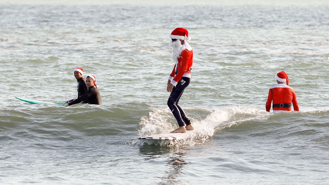 Surfing Santas packs them in at Cocoa Beach
