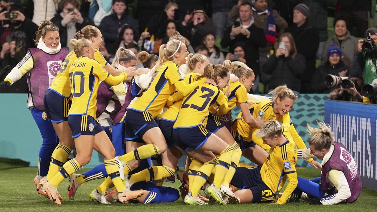 Sweden celebrate after defeating the United States in a penalty shootout in their Women's World Cup round of 16 soccer match in Melbourne, Australia on Sunday, Aug. 6, 2023.