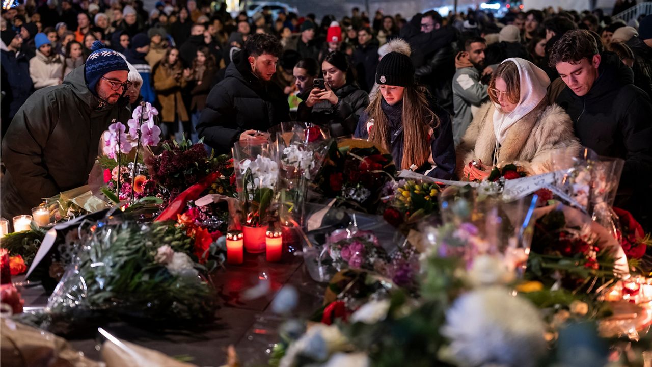 Revelers at Swiss Alpine bar describe horror and panic when fire broke out, leaving about 40 dead