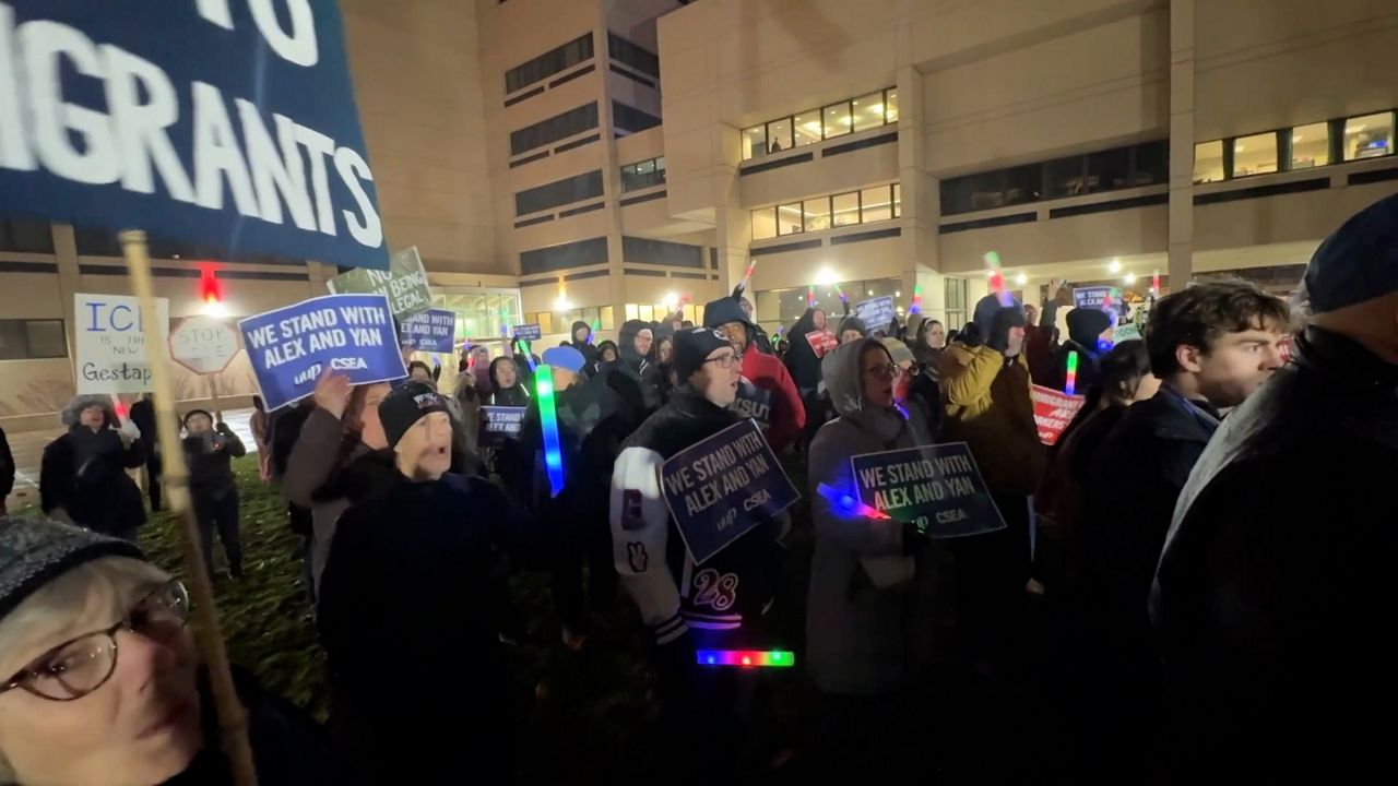 Rally held in support of two men detained by ICE