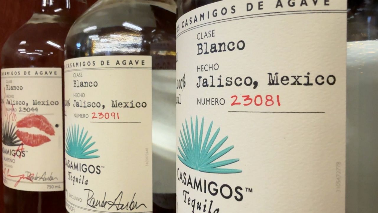 Bottles of Mexican tequila sit on a shelf at a local liquor store. Mexico is one of the nations facing sweeping tariffs from the United States. (Spectrum News 1/Dan Reidy)