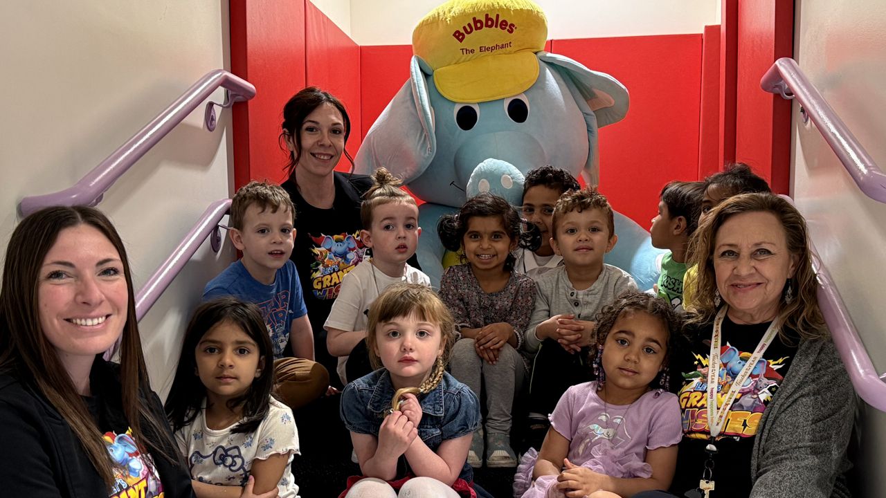 Students and staff at The Learning Experience in Shrewsbury pose for a photo on Thursday. (Spectrum News 1/Devin Bates)