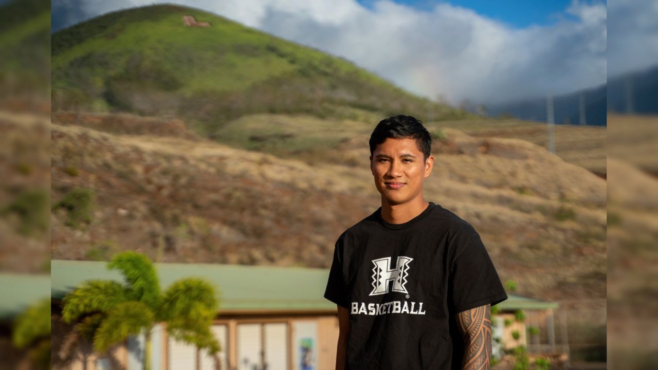 TJ Rickard, Lahainaluna High School boys basketball coach, poses for a portrait at Lahainaluna High School, Monday, Nov. 18, 2024, in Lahaina, Hawaii. (AP Photo/Mengshin Lin)