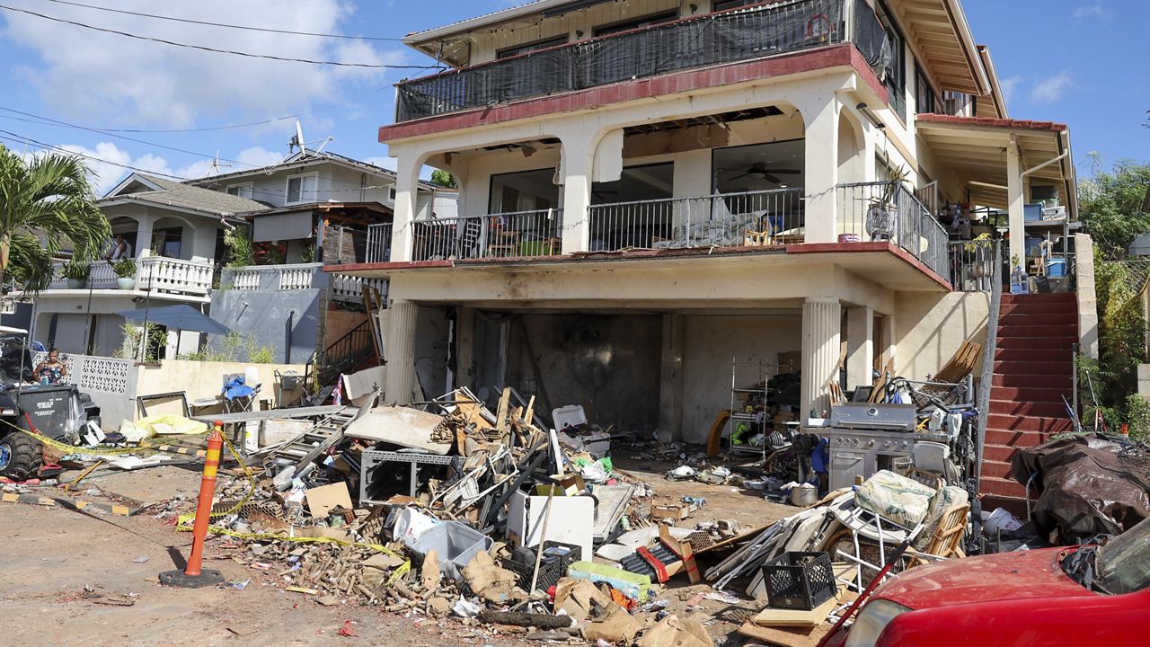 A view of the home where a New Year's Eve fireworks explosion killed and injured people. (AP Photo/Marco Garcia)