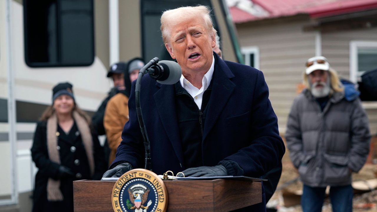 President Donald Trump speaks as he meets with homeowners affected by Hurricane Helene in Swannanoa, N.C., Friday, Jan. 24, 2025. (AP Photo/Mark Schiefelbein)