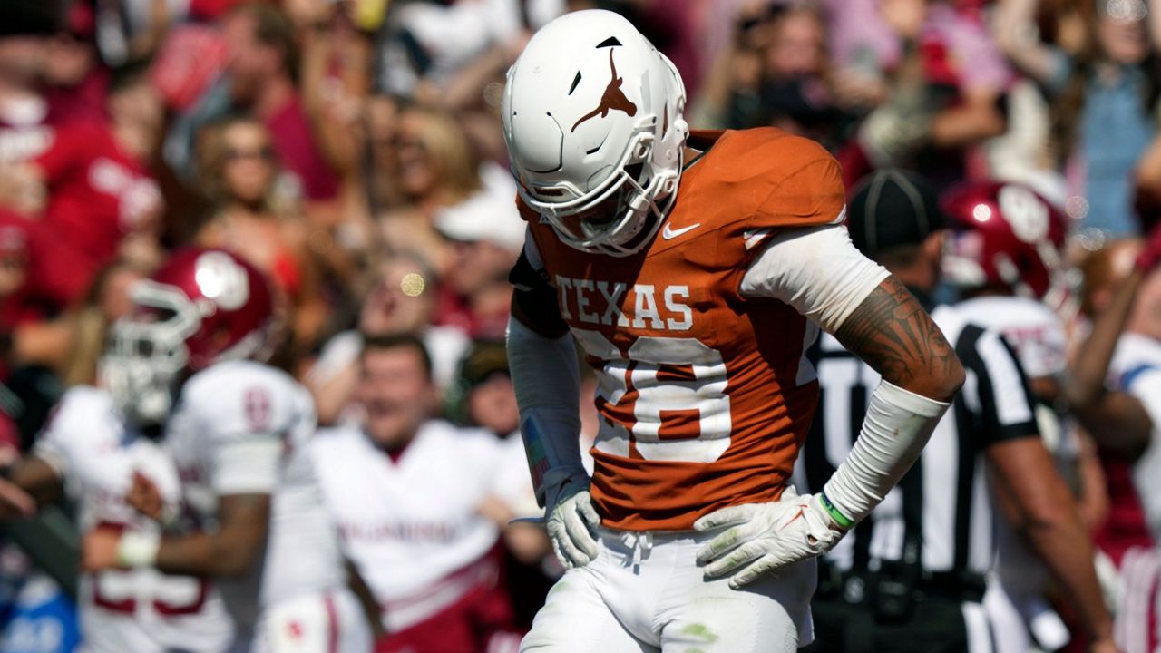Texas defensive back Jerrin Thompson (28) reacts to giving up the winning touchdown during the second half of an NCAA college football game against Oklahoma at the Cotton Bowl in Dallas, Saturday, Oct. 7, 2023. (AP Photo/LM Otero)