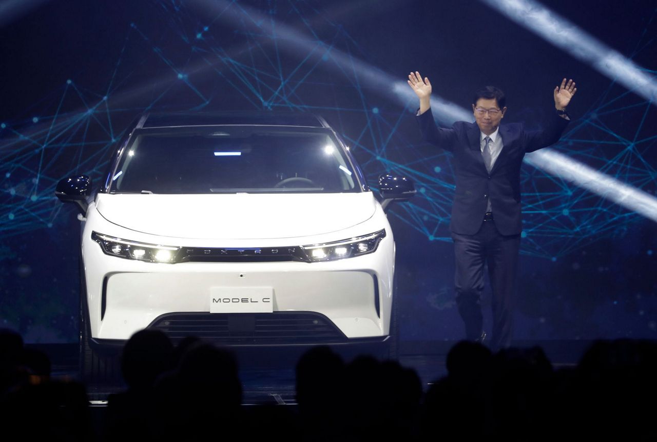 Smartphone maker Foxconn unveils EV for Taiwan brand Yulon