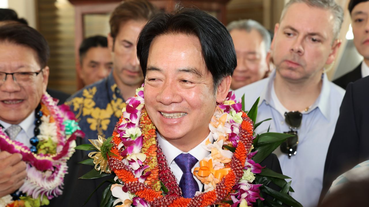 Taiwan President Lai Ching-te greets people at the Kahala Hotel and Resort Saturday, Nov. 30, 2024 in Honolulu. (AP Photo/Marco Garcia)